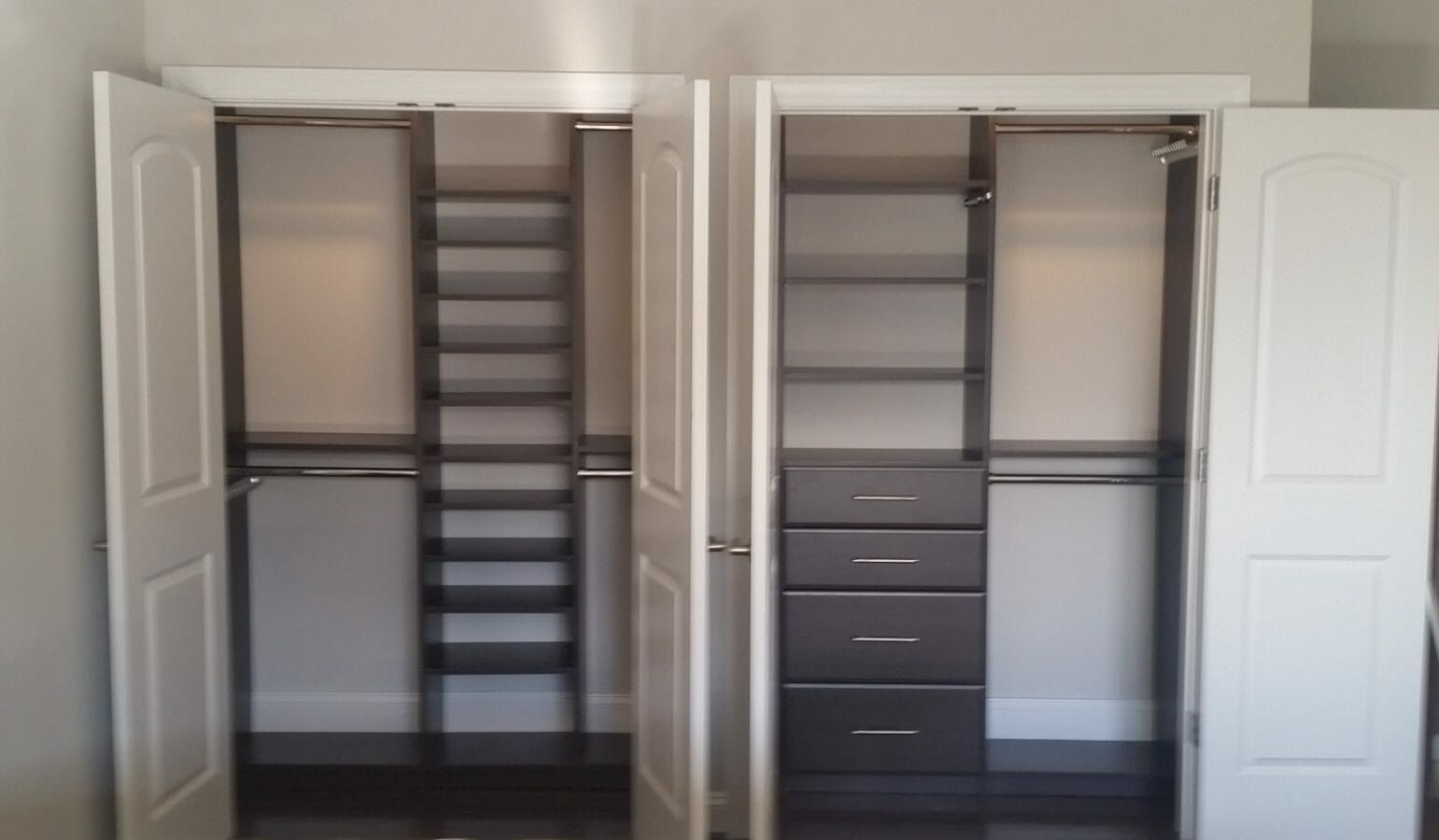 Pair of reach-in closets in espresso and white