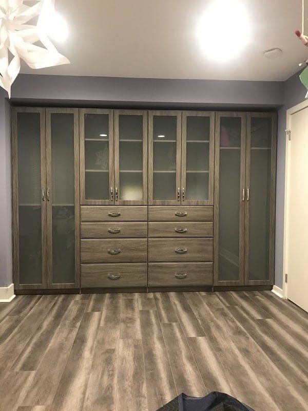 Gray wardrobe closet with glass doors and drawers in Yardley